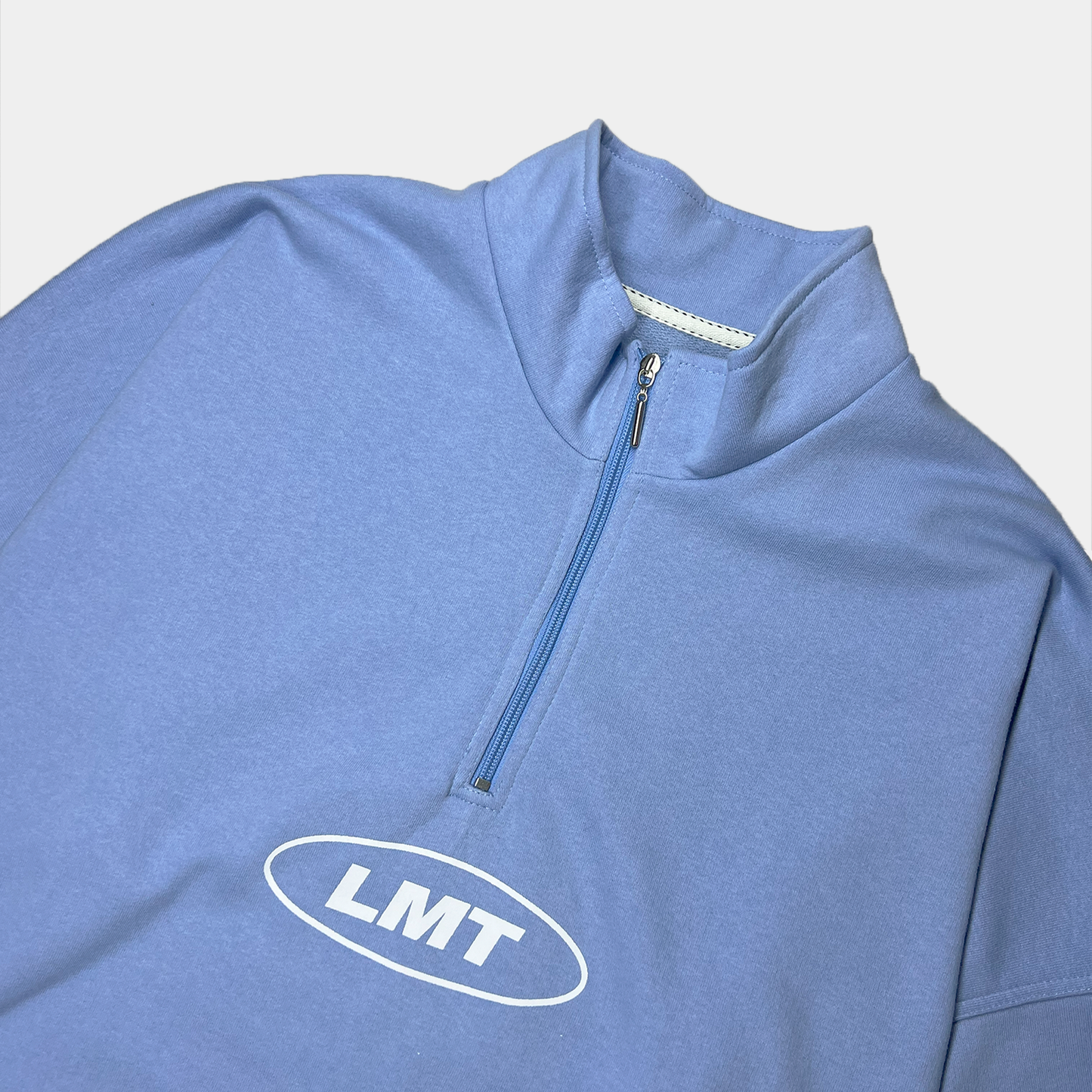 BUZO MOCKNECK AZUL CLARO