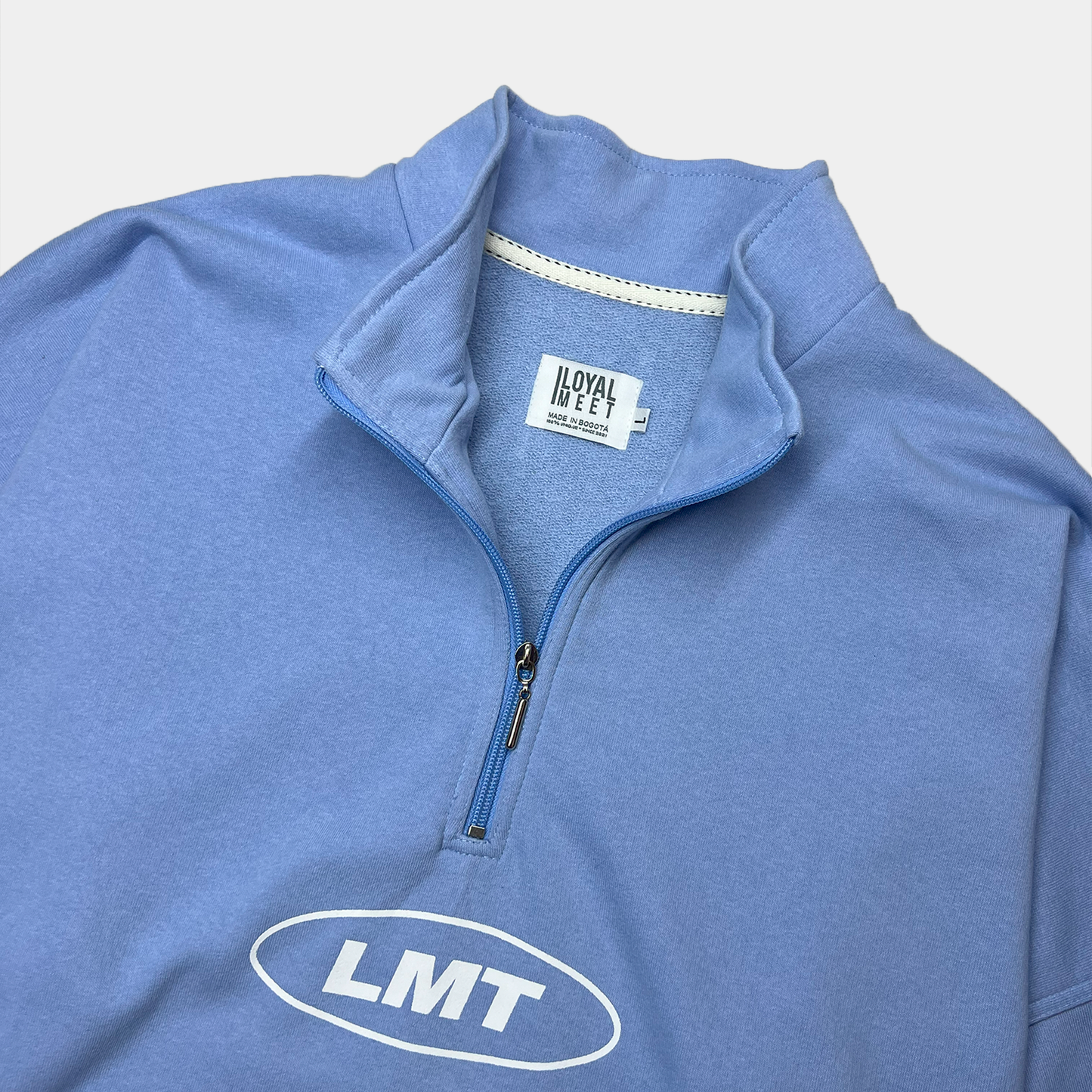 BUZO MOCKNECK AZUL CLARO