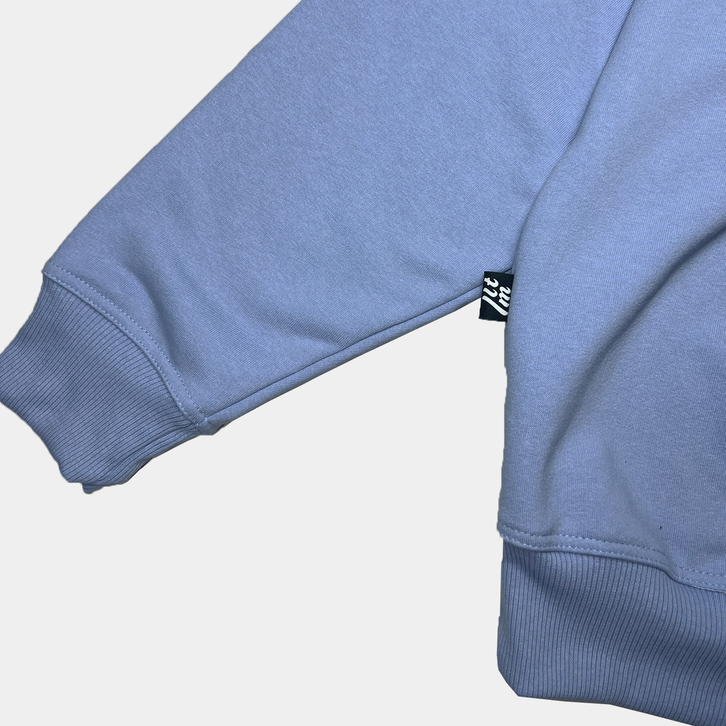 BUZO MOCKNECK AZUL CLARO